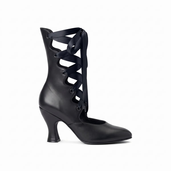 A black leather mid-calf boot with a high kitten heel and decorative criss-cross ribbon laces, shown from a side profile on a white background.