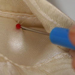 <p>How to Open the Stitches on a Vest Pocket</p>
